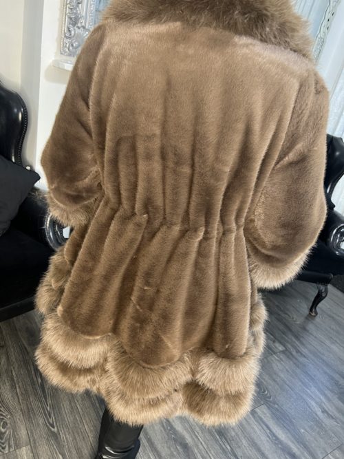 back of brown drwastrimg coat